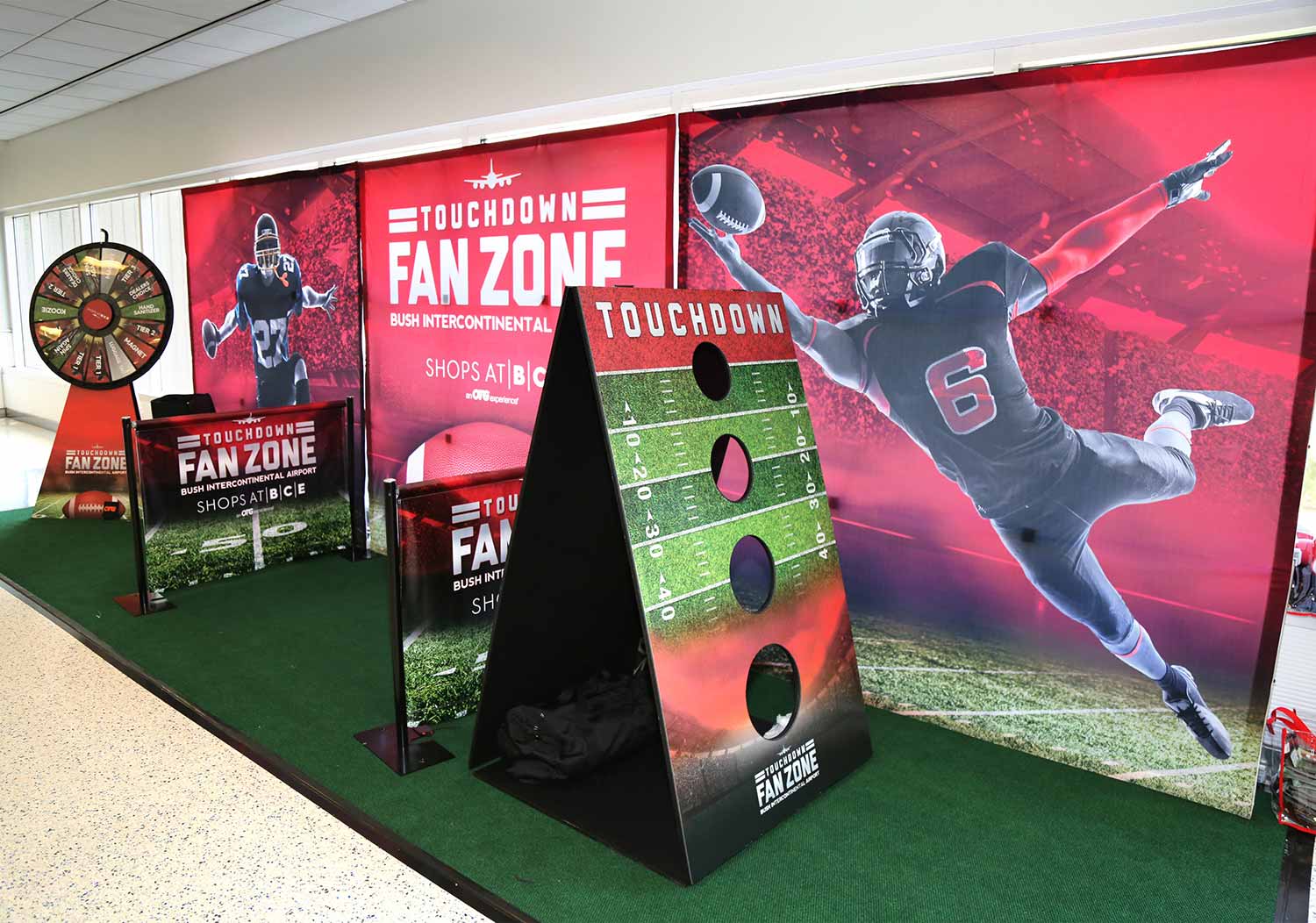 Design of booth and games for Super Bowl event in United Airlines terminals at IAH Houston, TX.