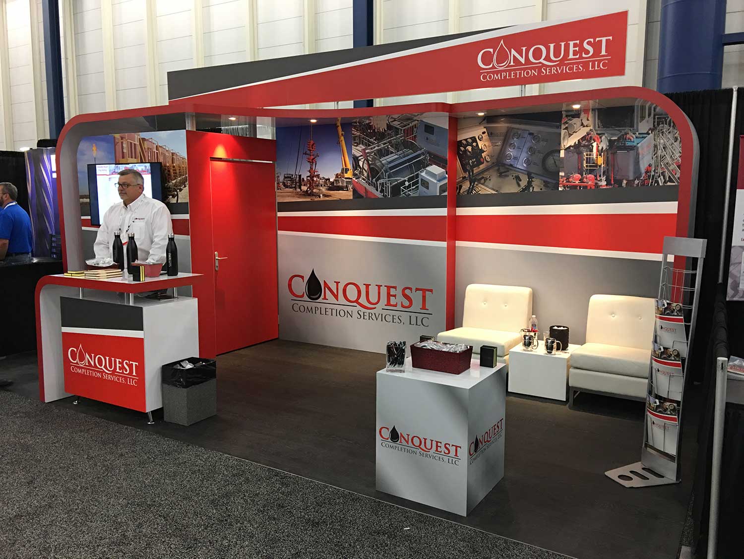 Trade show booth design, brochures, promotional items for Conquest at George Brown Convention Center.